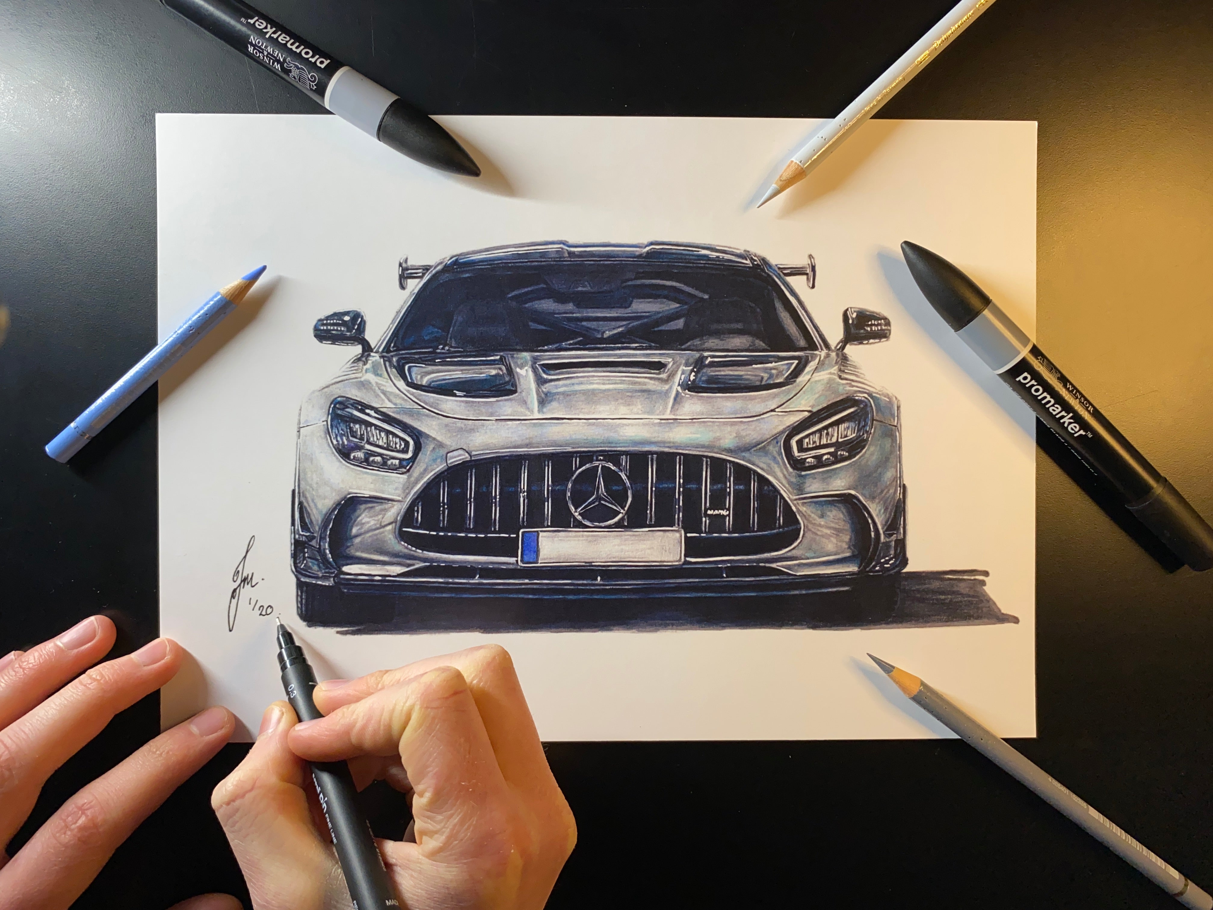 A4 limited edition art print of my realistic coloured pencil drawing of a silver Mercedes AMG GTR super car by tom mothersole