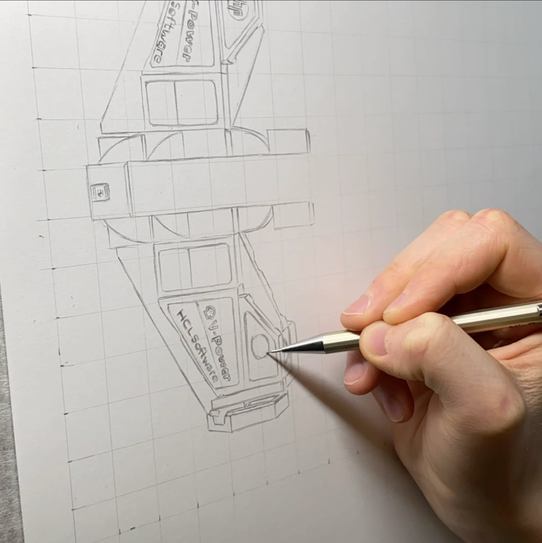 Hand drawing a detailed design of a lego ferrari f1 car on grid paper with a pen.