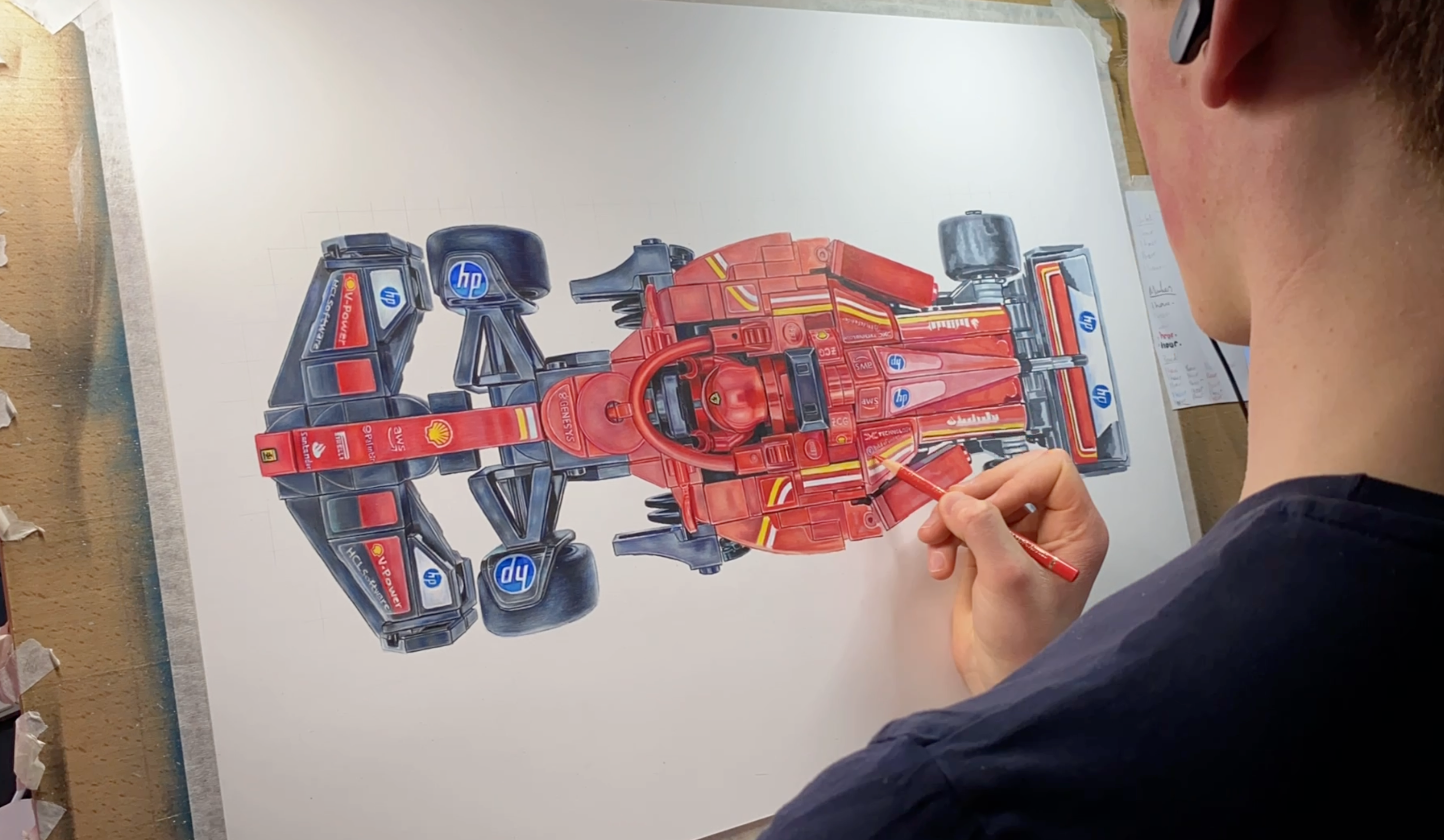 tom mothersole creating a realistic coloured pencil drawing of the LEGO Ferrari F1 car