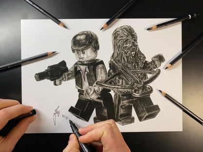 A4 limited edition art print of my realistic graphite pencil drawing of the LEGO Han Solo and Chewbacca Minifigures from Starwars by tom mothersole lego art