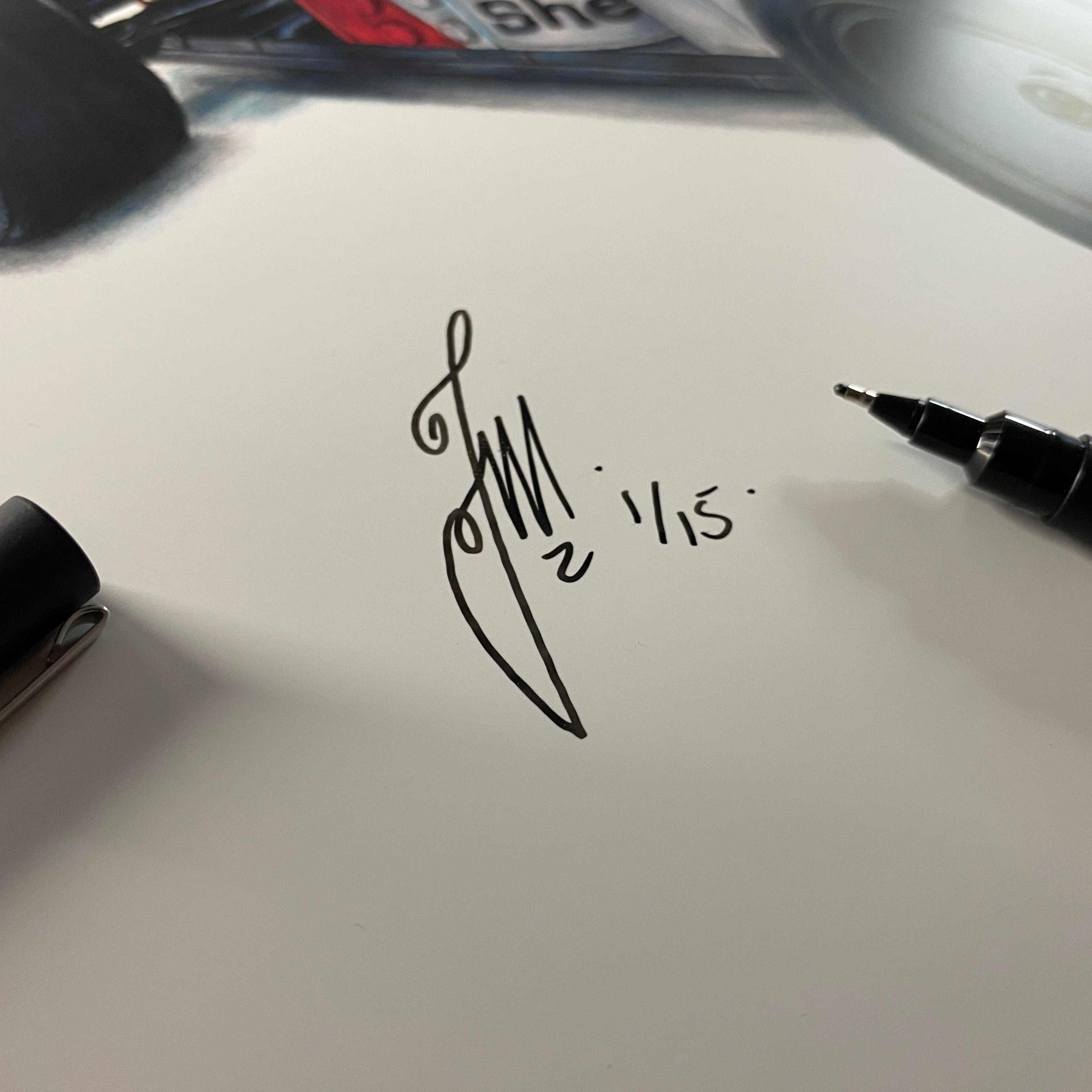 close up of tom mothersole's signature on limited edition fine art print of realistic coloured pencil drawing of LEGO Icons Ayrton Senna's red and white McLaren MP4/4 F1 car by tom mothersole lego art