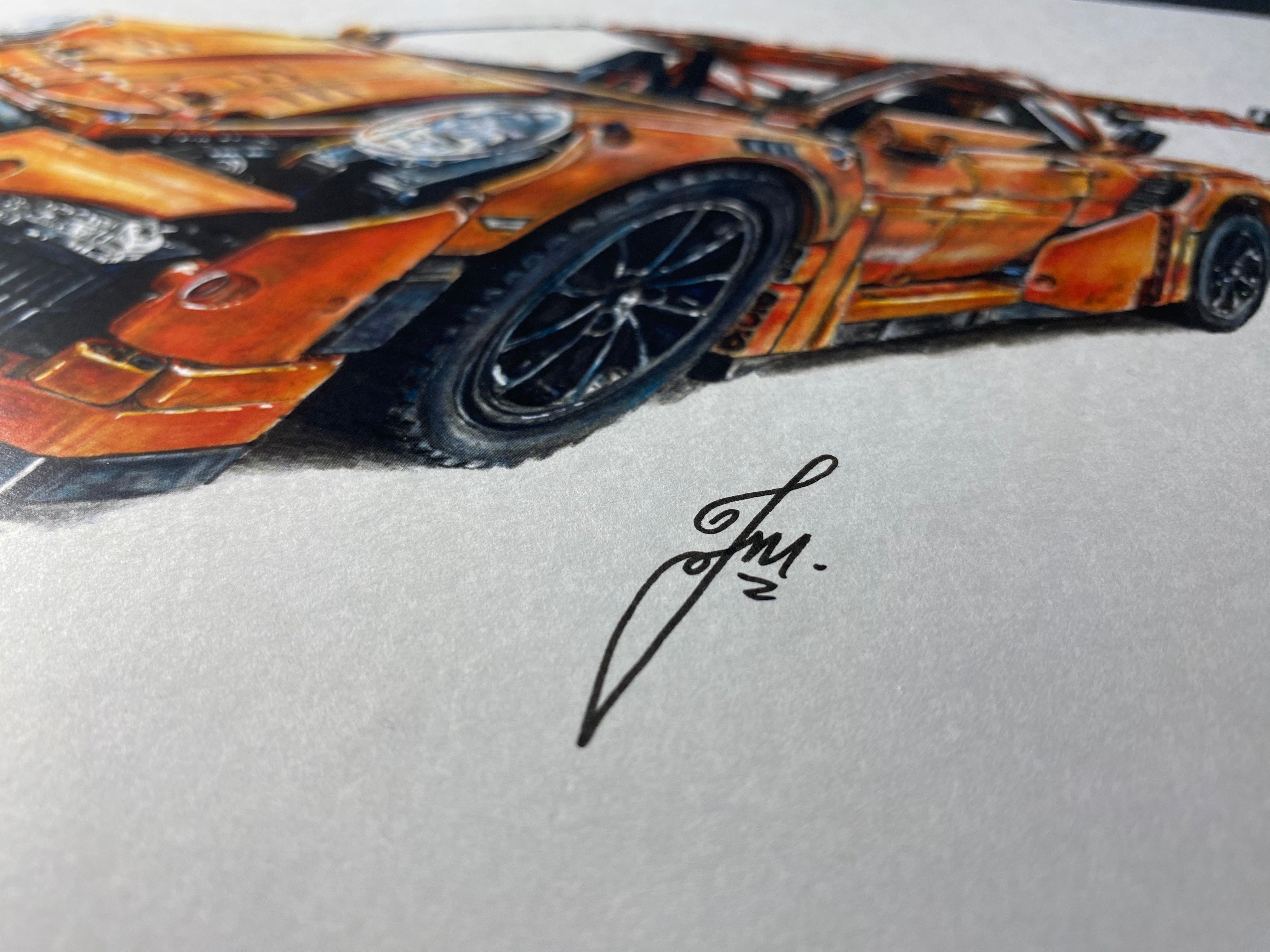 A4 limited edition art print of my realistic coloured pencil drawing of the orange LEGO Technic Porsche 911 GT3 RS by Tom Mothersole