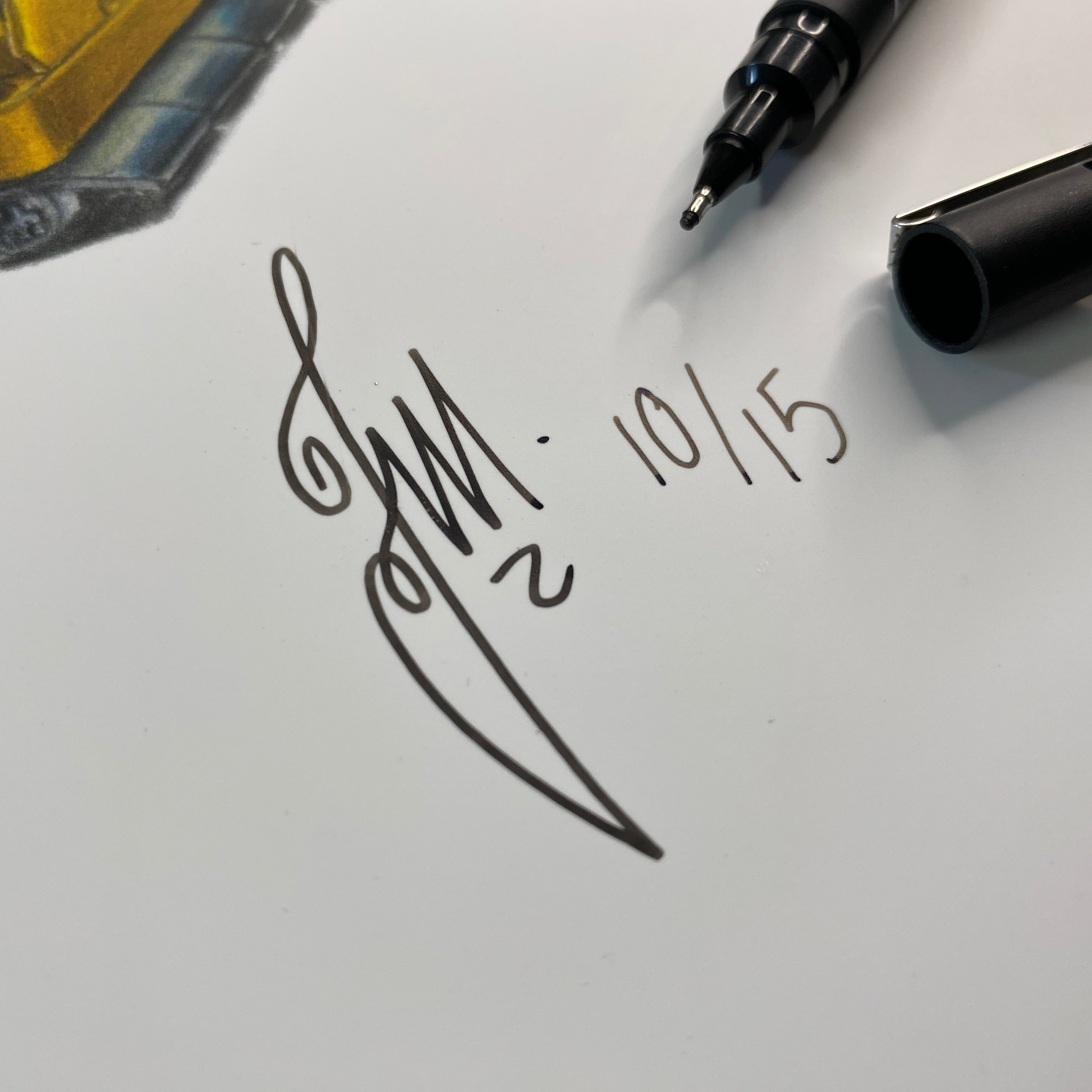 close up of tom mothersoles signature on limited edition fine art print of the lego technic mclaren P1 