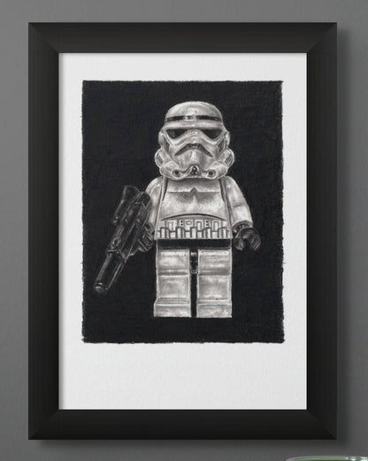 Framed print of a LEGO stormtrooper minifigure graphite pencil drawing from starwars by tom mothersole lego art