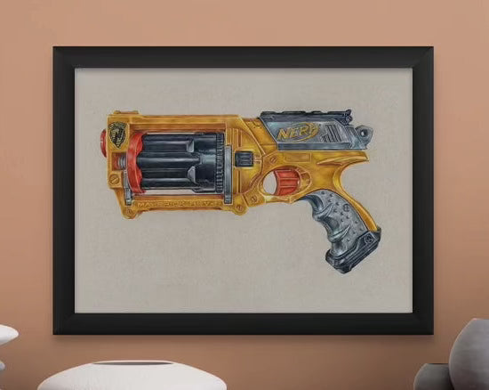 framed print of my realistic coloured pencil drawing of the Nerf maverick