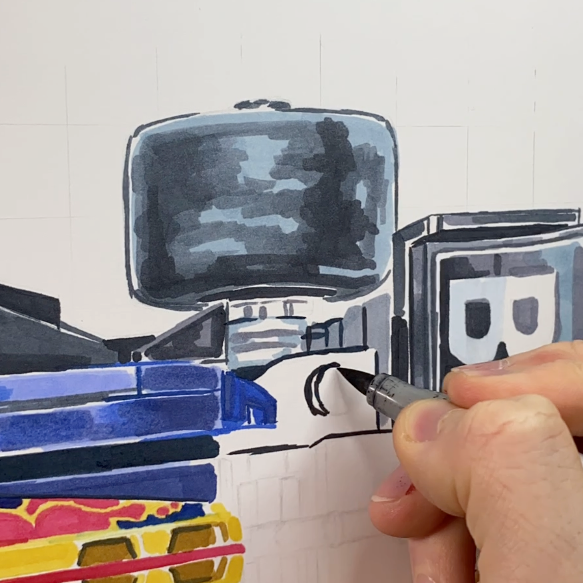 tom mothersole using alchol markers on the rear wing of the lego redbull f1 car speedchampion